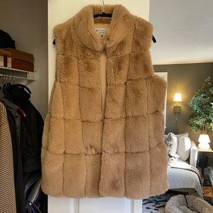 like new faux fur vest